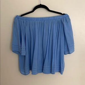 blue off the shoulder shirt